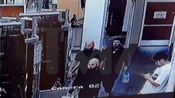 
Surveillance footage shows attackers entering La Fitness gym moments before 6ix9ine getting jumped 