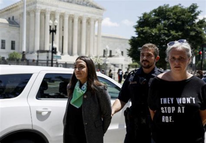 
Viral video of AOC pretending to be handcuffed sparks online debate 
